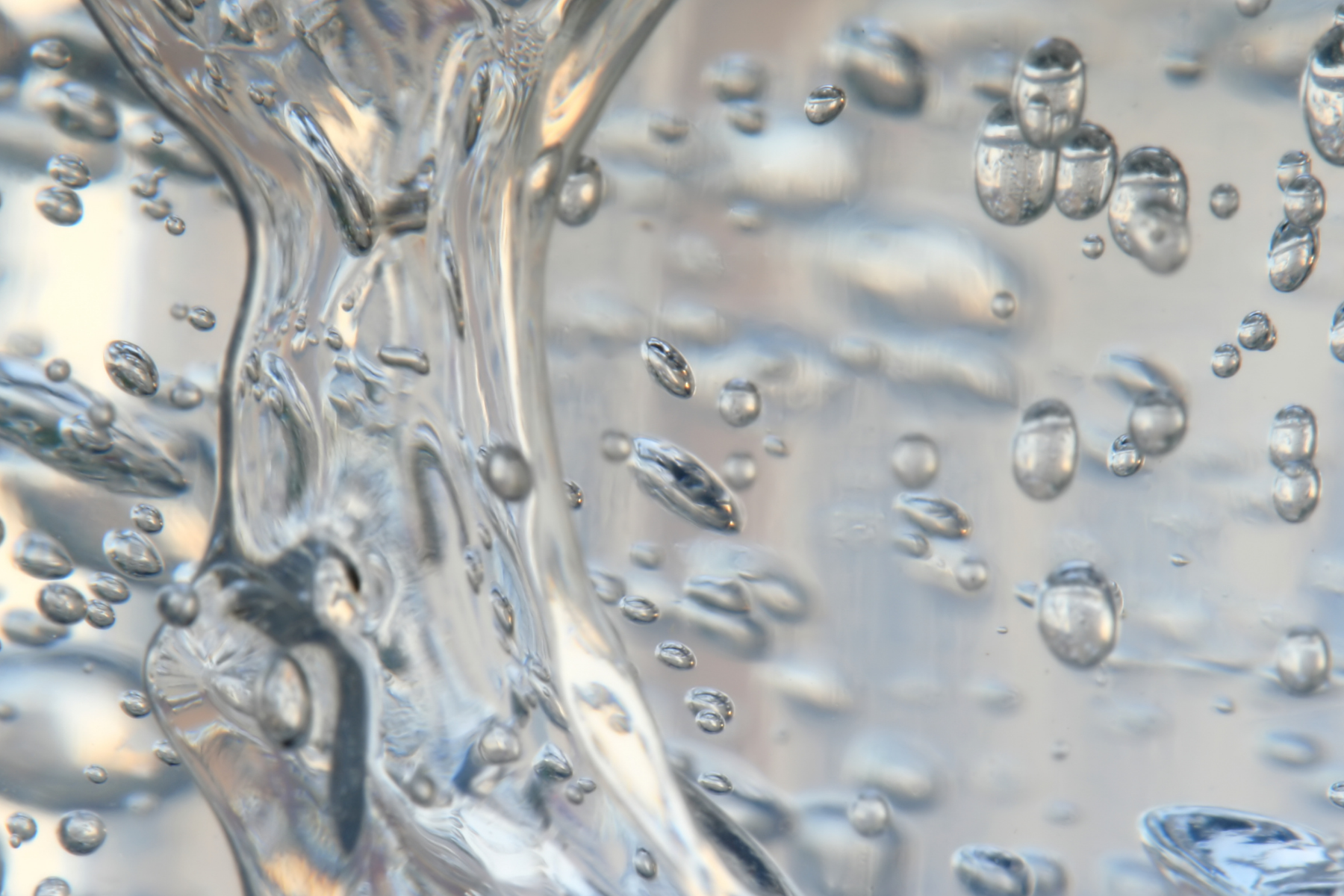 VAHNAI Redness and Sensitivity — ingredient flat-lay with sea buckthorn oil, bisabolol cream texture, blueberry extract, and chamomile petals.