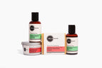 Heliotrope SF Small Body Care Travel Basket with exfoliating wash, lotion, hair care, bamboo puff, and massage candle
