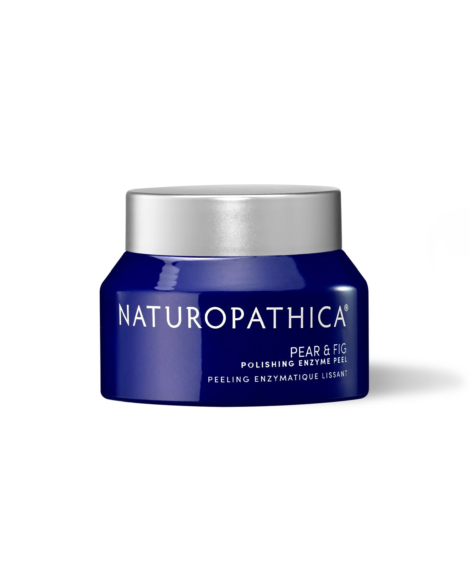 Open jar of Naturopathica Pear & Fig Polishing Enzyme Peel with fresh pear slices and fig accents, styled as a brightening exfoliating mask

